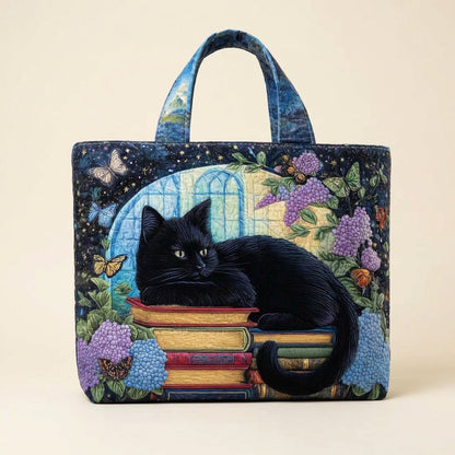 Quilted Tote Bag - Black Cat on Books, studio photo